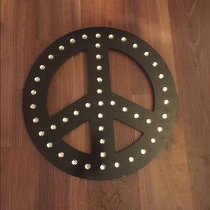 Black peace sign wall decoration with white sequin